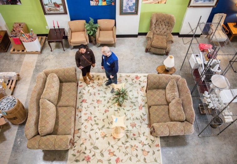 Top view of customers browsing through the furniture
